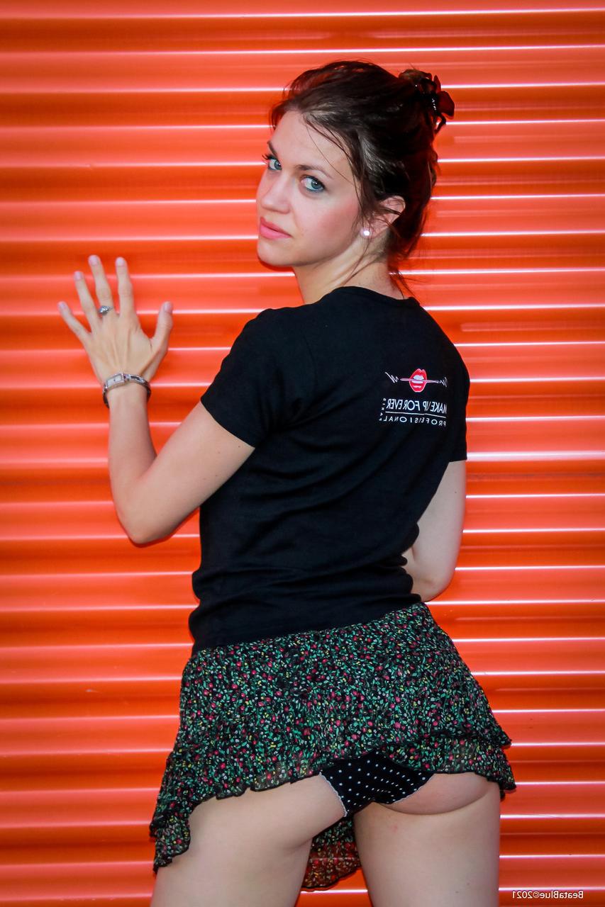 20P Raven-haired hottie flashes her black panties while posing in public
