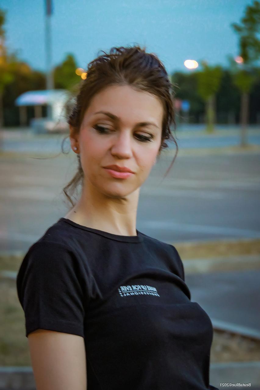20P Raven-haired hottie flashes her black panties while posing in public