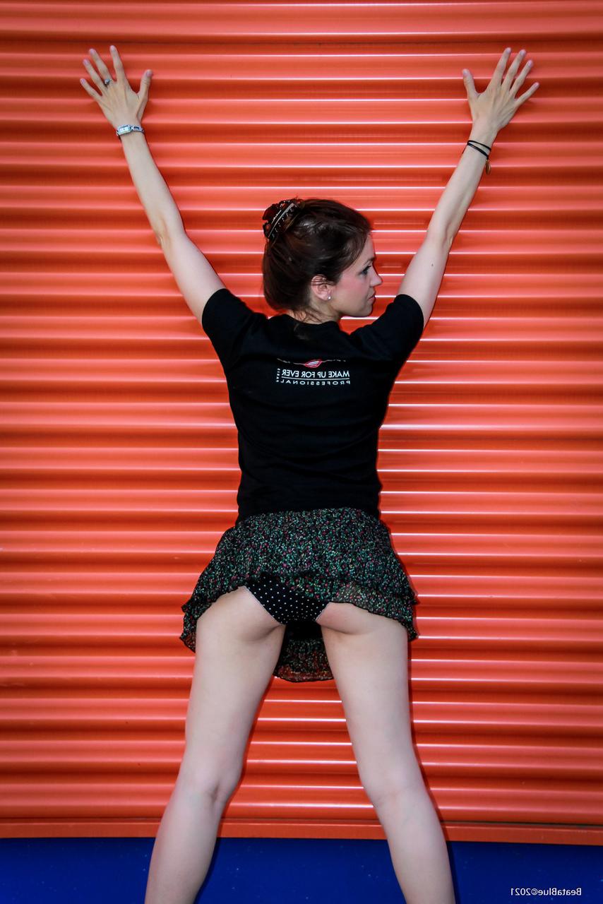 20P Raven-haired hottie flashes her black panties while posing in public