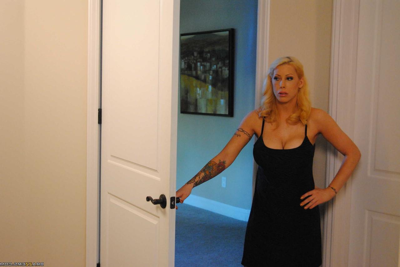 20P Busty blonde MILF Candy Manson poses in stocking and teases guy with her boobs