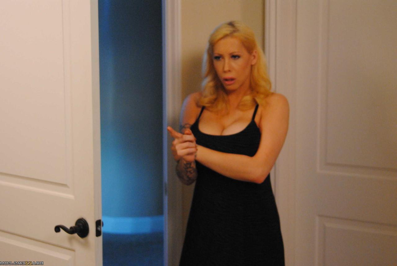 20P Busty blonde MILF Candy Manson poses in stocking and teases guy with her boobs