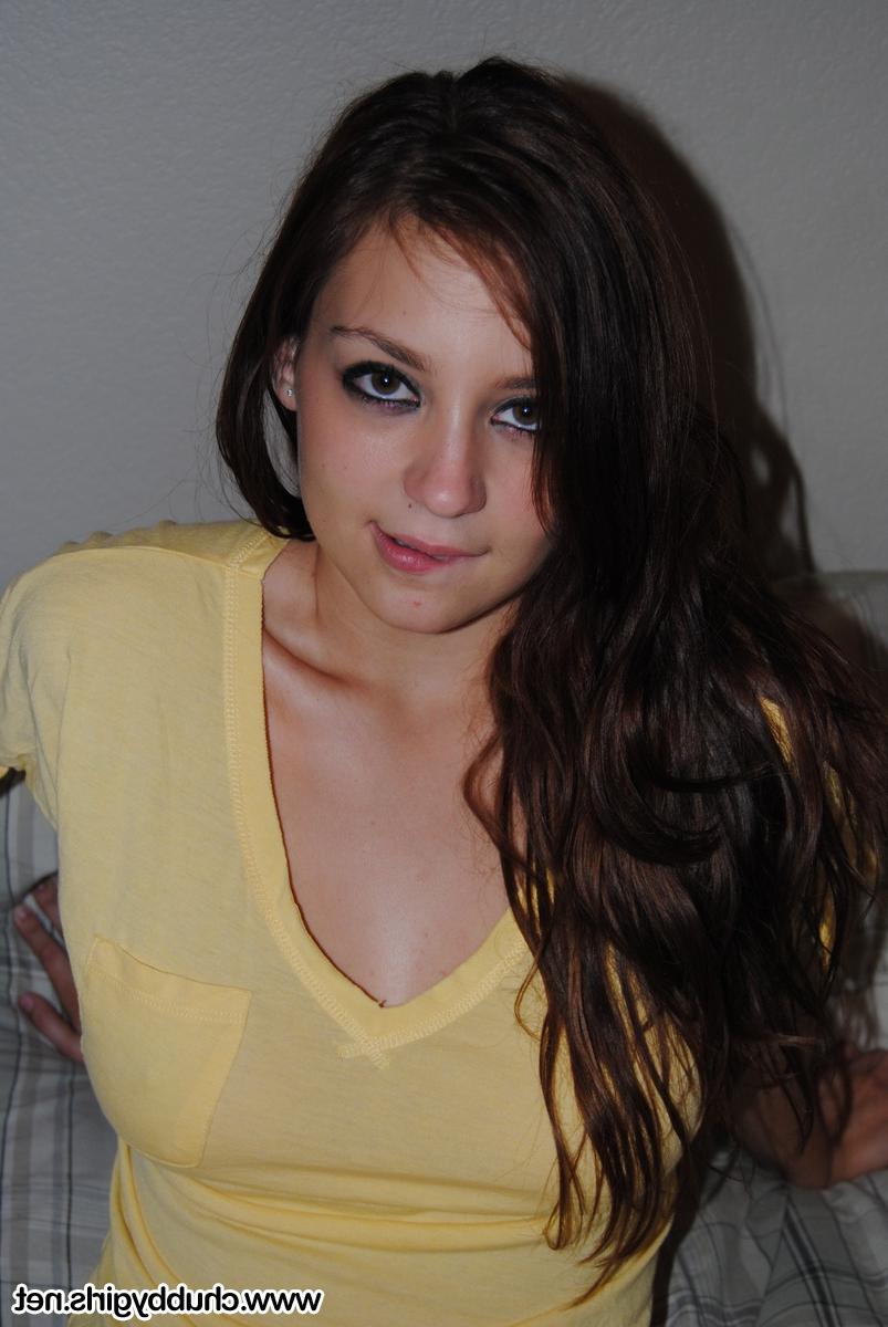 16P Brunette solo girl with painted toenails exposes her bare boobs