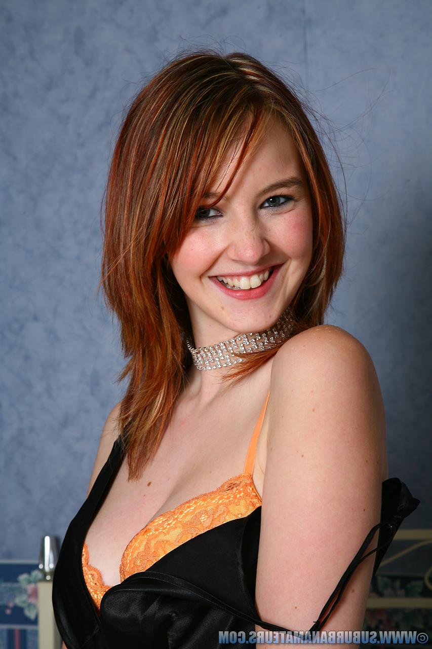 12P Redhead amateur with a great smile dildos her asshole after getting undressed