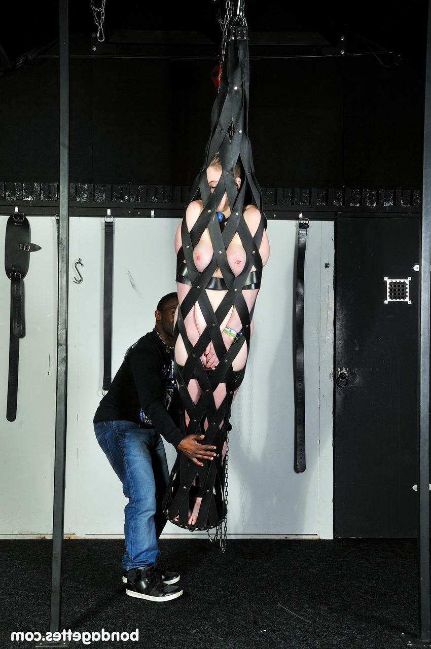 20P Submissive blonde Carly Rae Summers gets a flogging while naked in bondage