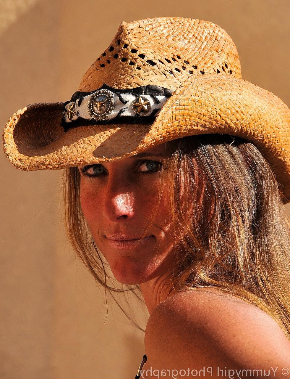 20P Tall MILF in a hat Sofie Marie posing in her tiny provocative bikini outside