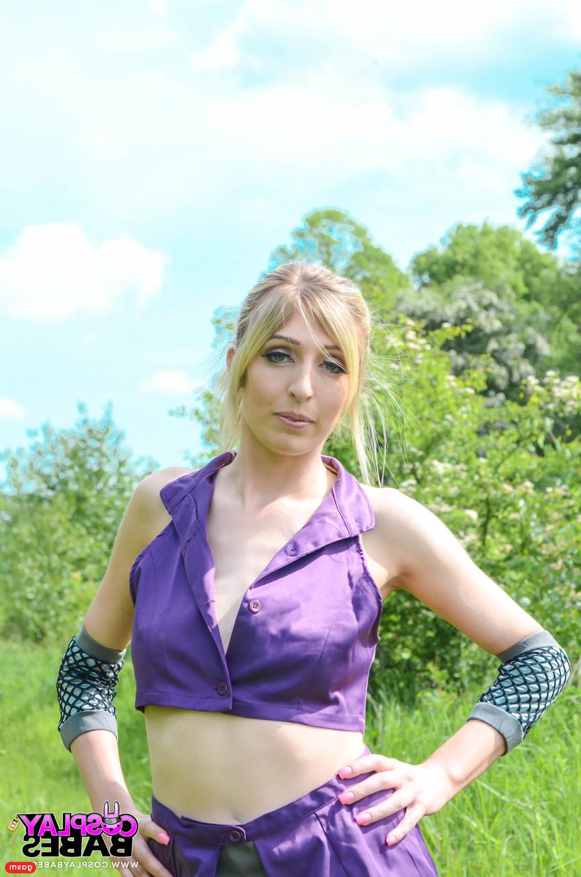 15P Gorgeous British model Jessica Jensen poses in her purple costume in nature