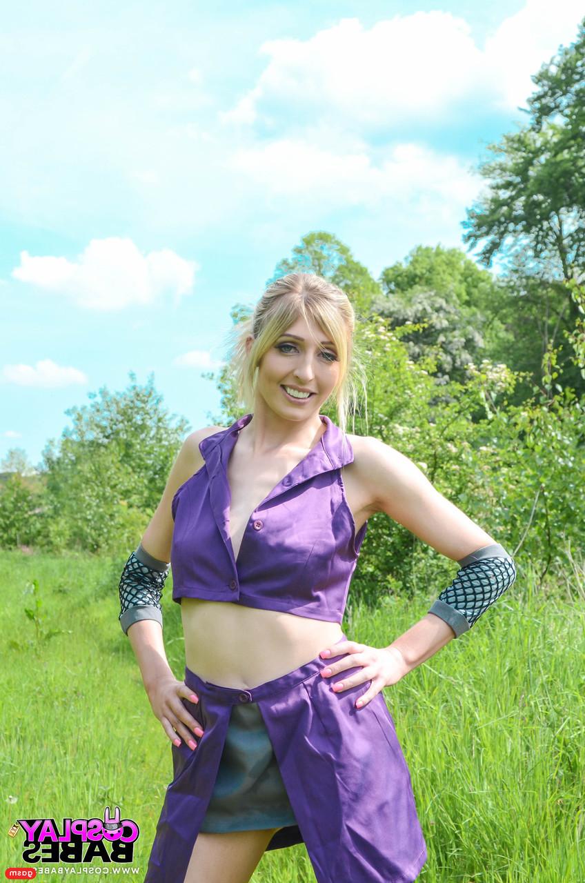 15P Gorgeous British model Jessica Jensen poses in her purple costume in nature