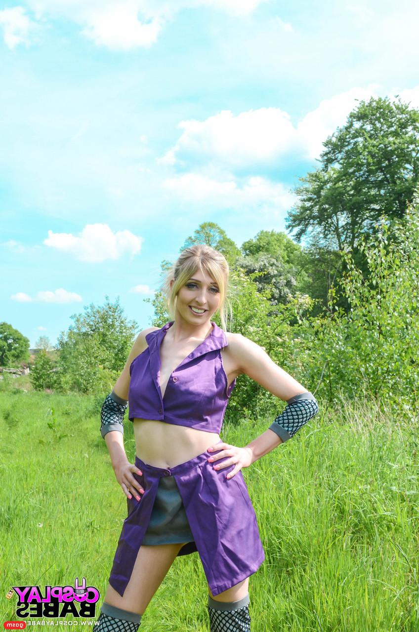 15P Gorgeous British model Jessica Jensen poses in her purple costume in nature