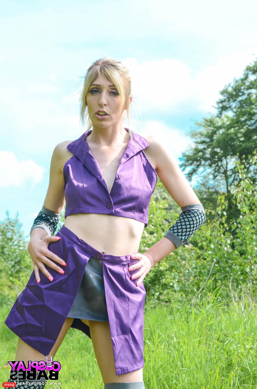 15P Gorgeous British model Jessica Jensen poses in her purple costume in nature