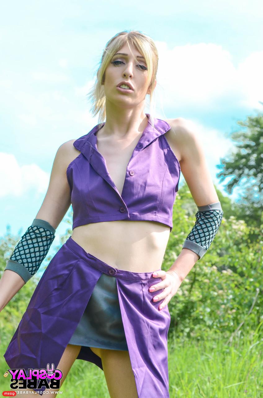 15P Gorgeous British model Jessica Jensen poses in her purple costume in nature