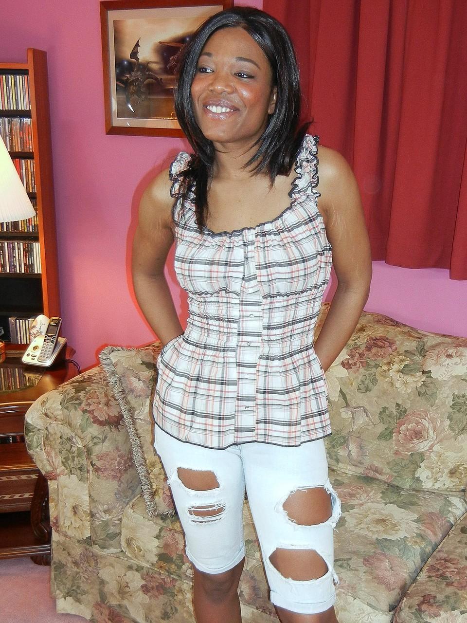 20P Adorable amateur ebony Kelly Stylz doffs her clothes and rubs her clit