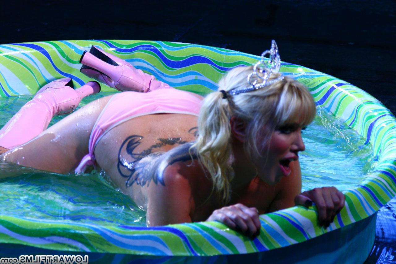 16P Lovely Angie is showing her nice big tits and blonde hair naked in the pool