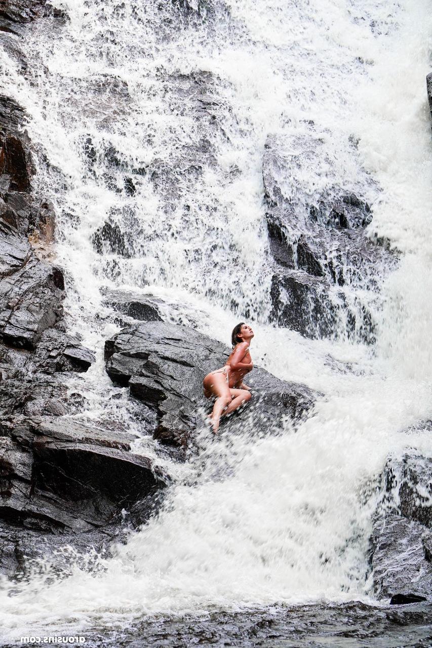 20P Sexy brunette Candice Demellza goes topless while teasing in a bikini outdoors
