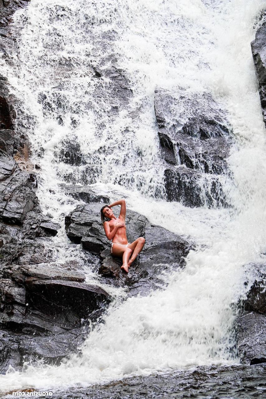 20P Sexy brunette Candice Demellza goes topless while teasing in a bikini outdoors