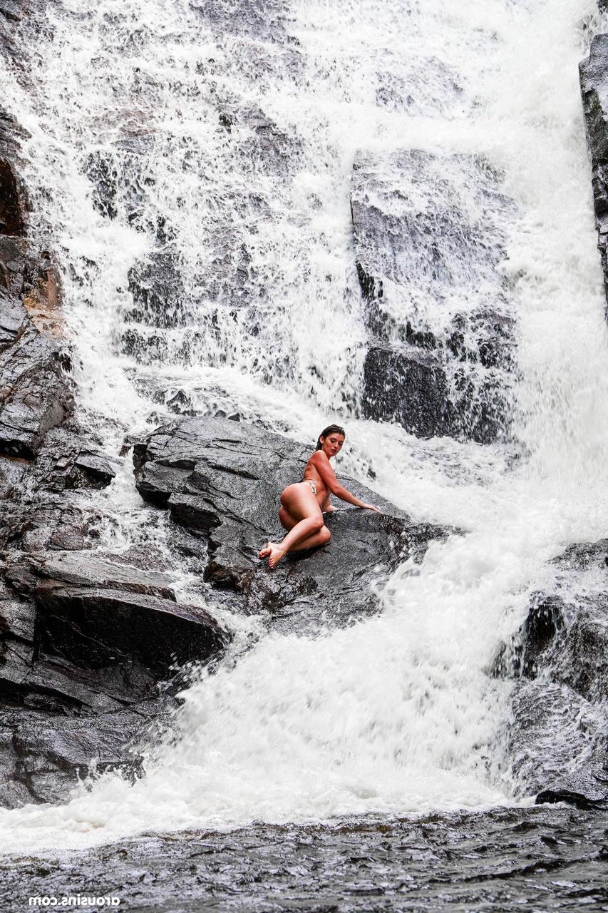 20P Sexy brunette Candice Demellza goes topless while teasing in a bikini outdoors
