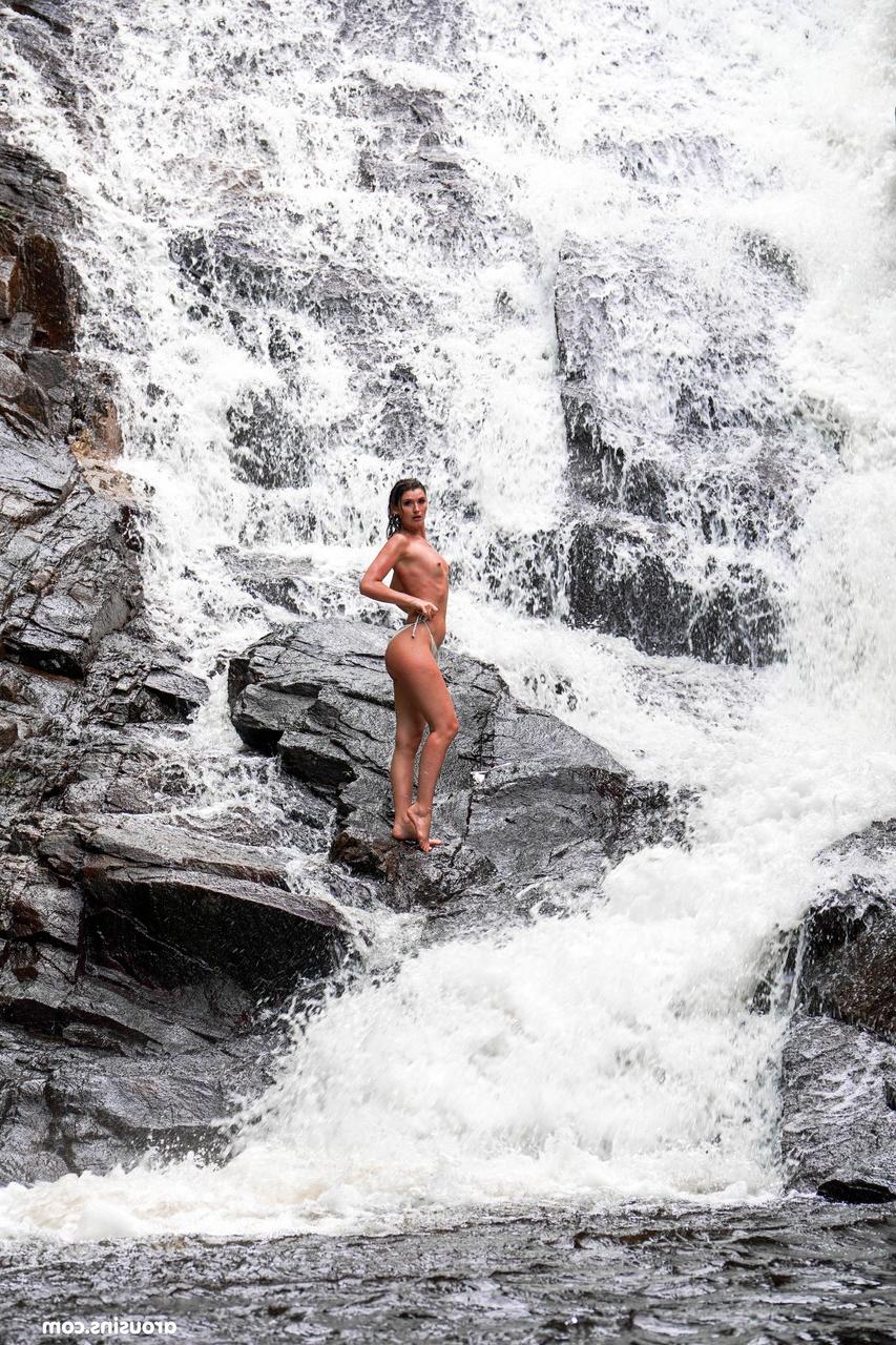 20P Sexy brunette Candice Demellza goes topless while teasing in a bikini outdoors