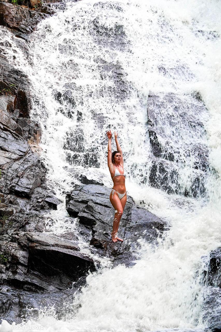 20P Sexy brunette Candice Demellza goes topless while teasing in a bikini outdoors