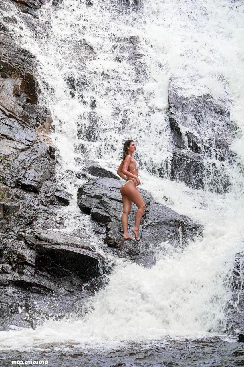 20P Sexy brunette Candice Demellza goes topless while teasing in a bikini outdoors