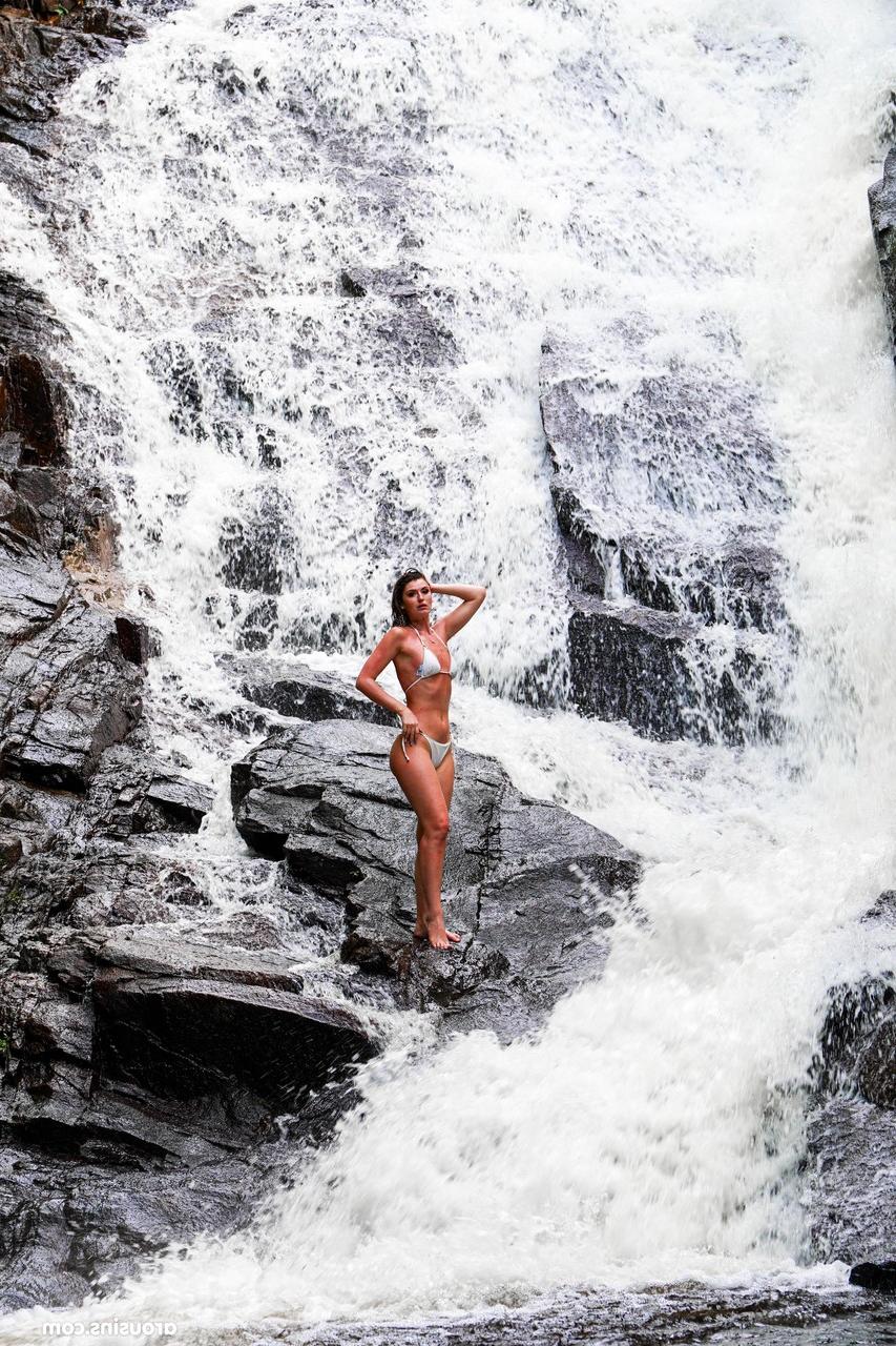 20P Sexy brunette Candice Demellza goes topless while teasing in a bikini outdoors