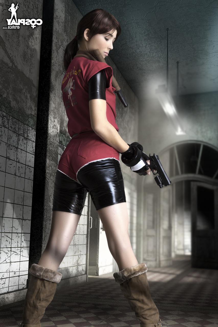 12P Cosplayer holds her bare ass after wielding a pistol in fingerless gloves
