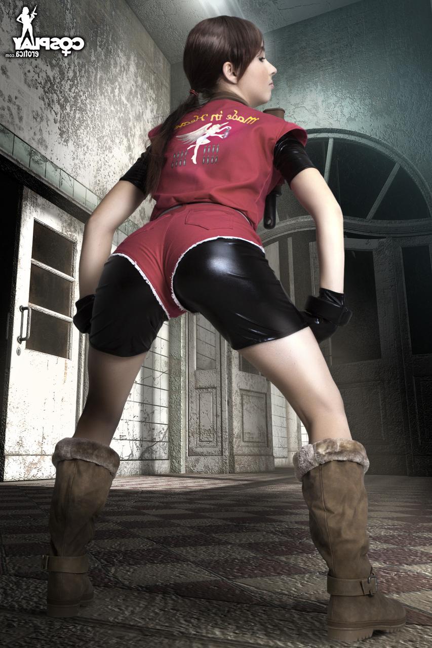 12P Cosplayer holds her bare ass after wielding a pistol in fingerless gloves