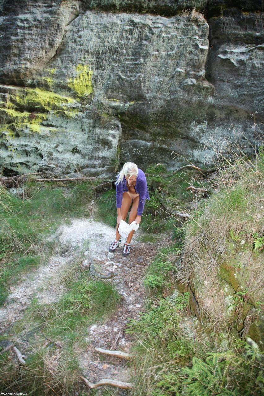 20P Blonde babe with a ponytail Sara J stripping and masturbating in the woods