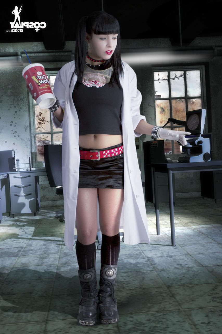 12P Cute cosplayer uncovers her nice tits before parting her labia lips