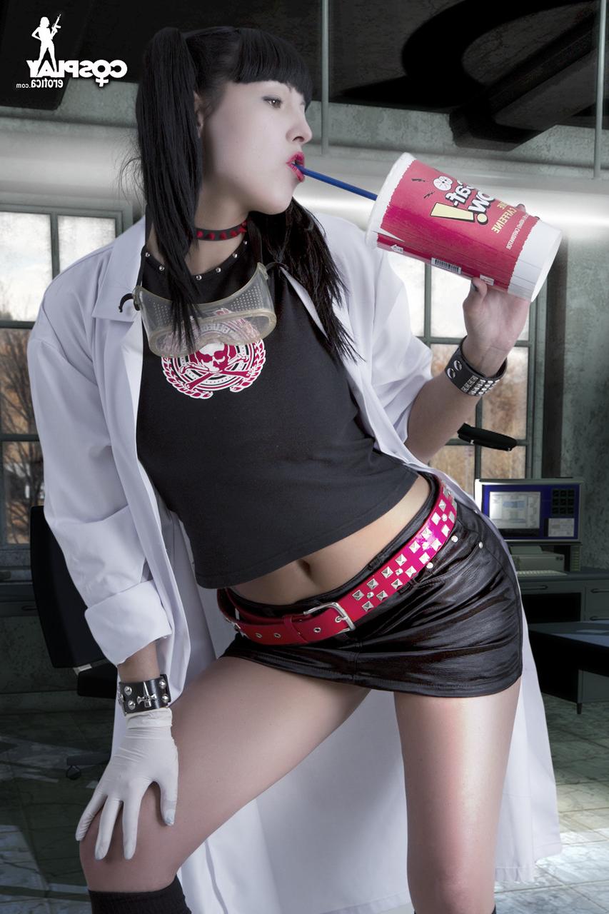 12P Cute cosplayer uncovers her nice tits before parting her labia lips