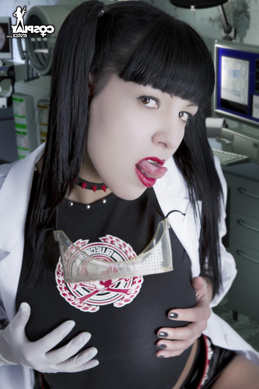 12P Cute cosplayer uncovers her nice tits before parting her labia lips