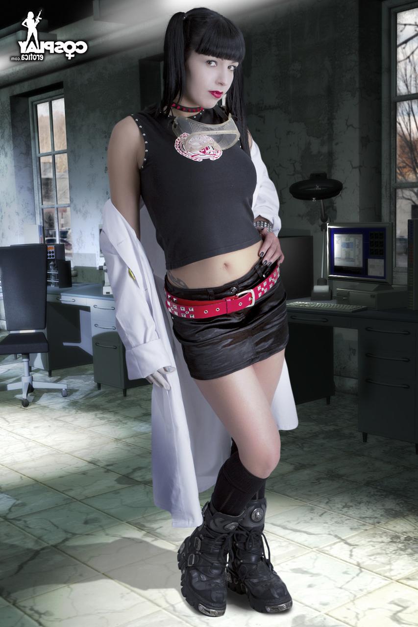 12P Cute cosplayer uncovers her nice tits before parting her labia lips