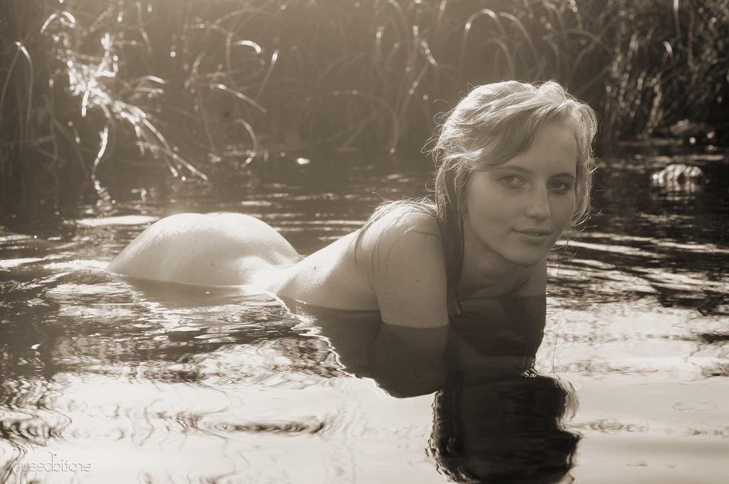 16P Eriska A takes a skinny dip in the lake before putting her bikini back on