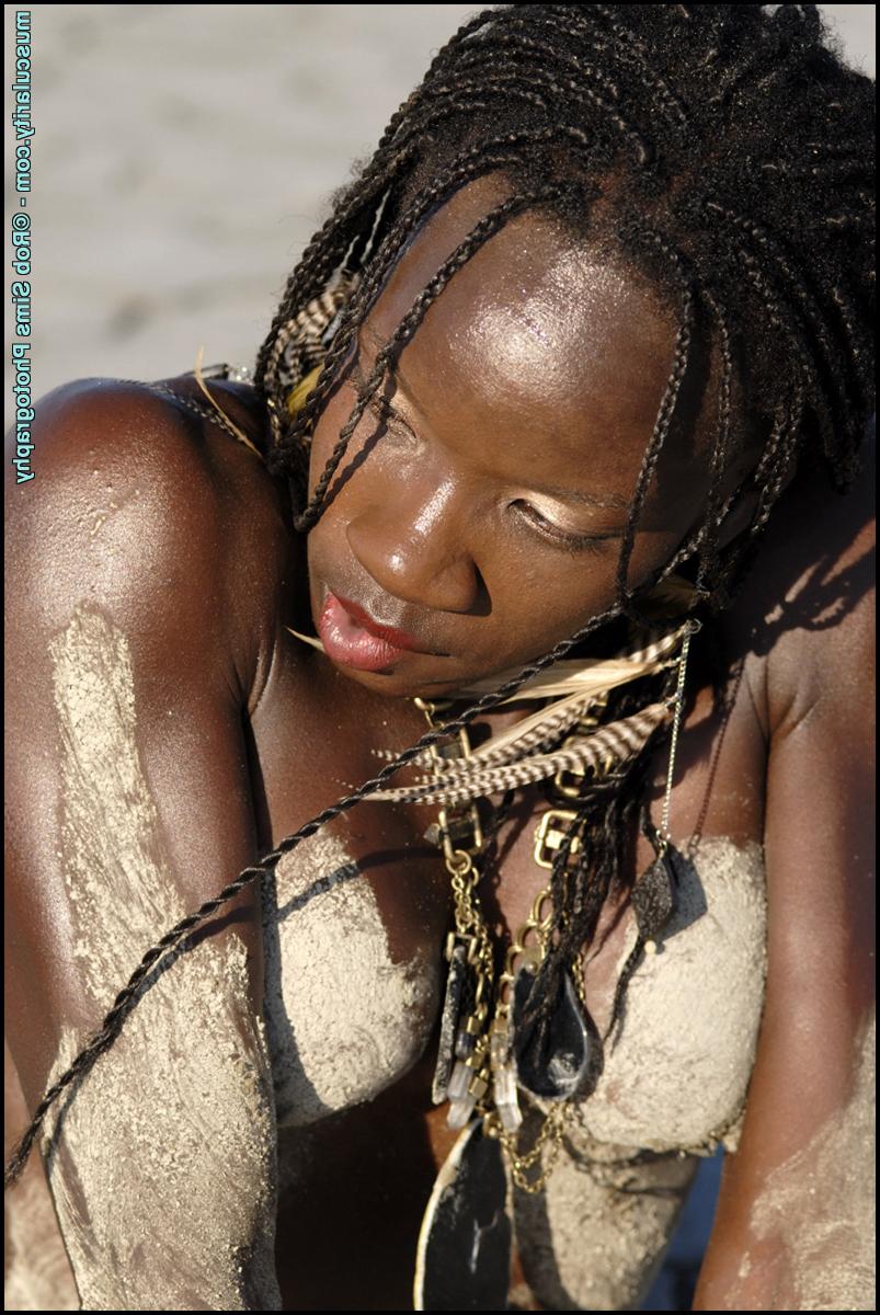 15P Ebony bodybuilder Camille Elizabeth strikes alluring poses on parched ground