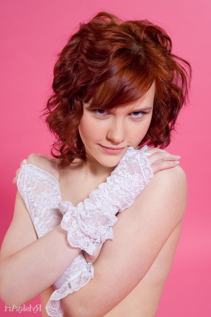 16P Pale redhead Anelie wears lace gloves while doffing sheer panties to pose nude