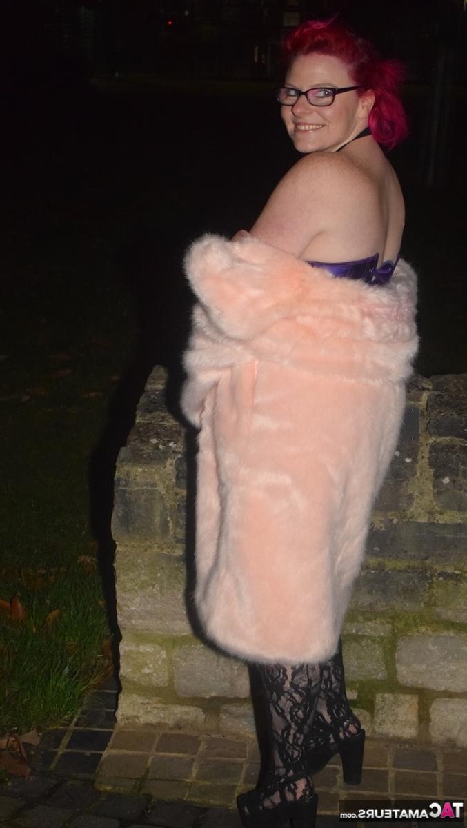 16P Redheaded amateur Mollie Foxxx flashes at night in a long coat
