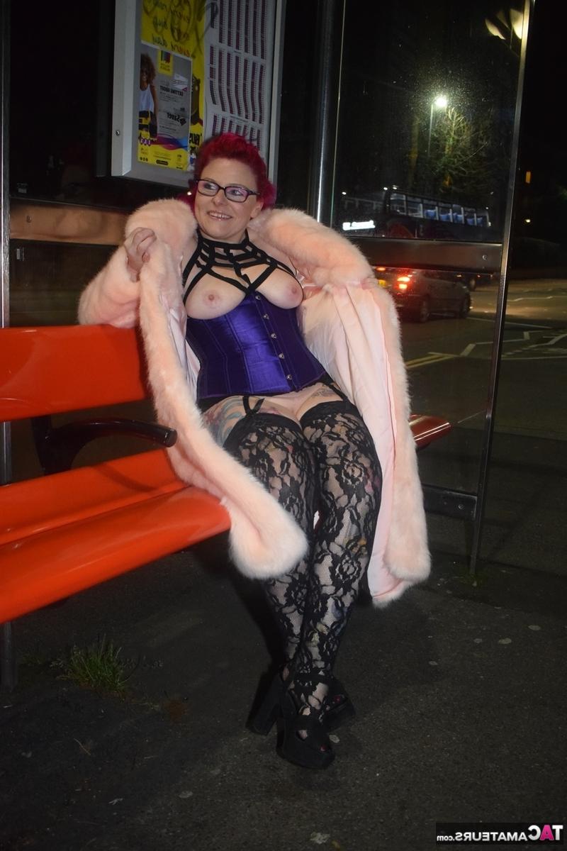 16P Redheaded amateur Mollie Foxxx flashes at night in a long coat
