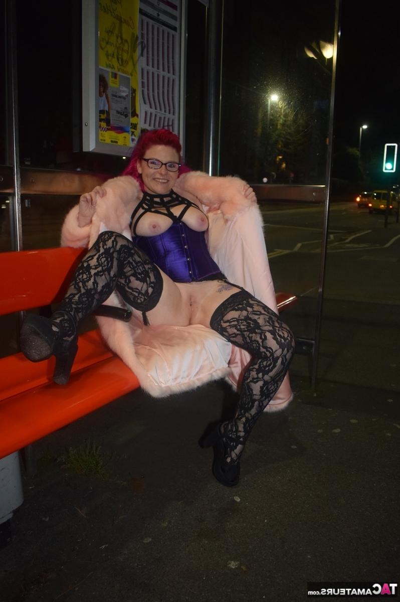 16P Redheaded amateur Mollie Foxxx flashes at night in a long coat