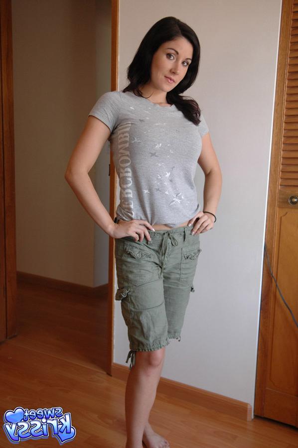 12P Pretty brunette Krissy in shorts removing her bra to fondle her big boobs