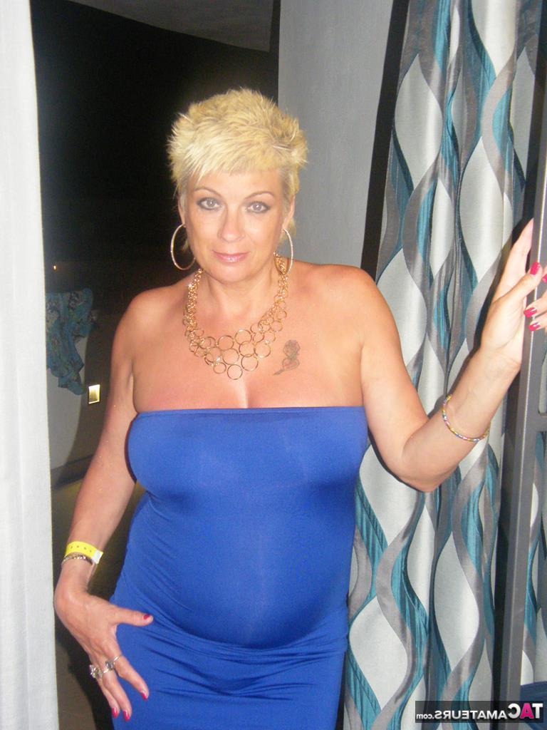 20P Middle-aged blonde Dimonty smokes while getting completely naked