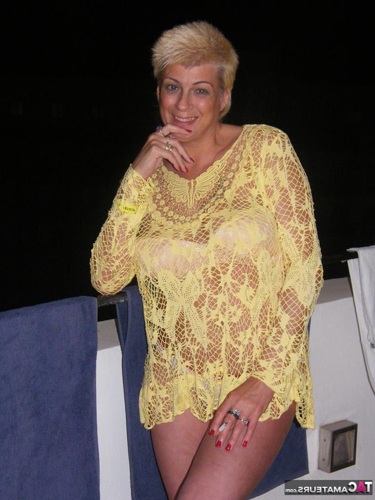 20P Middle-aged blonde Dimonty smokes while getting completely naked