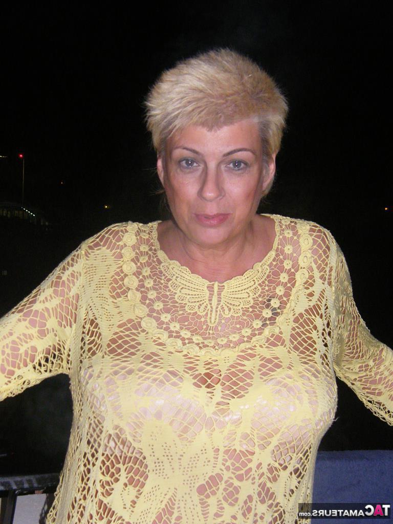 20P Middle-aged blonde Dimonty smokes while getting completely naked