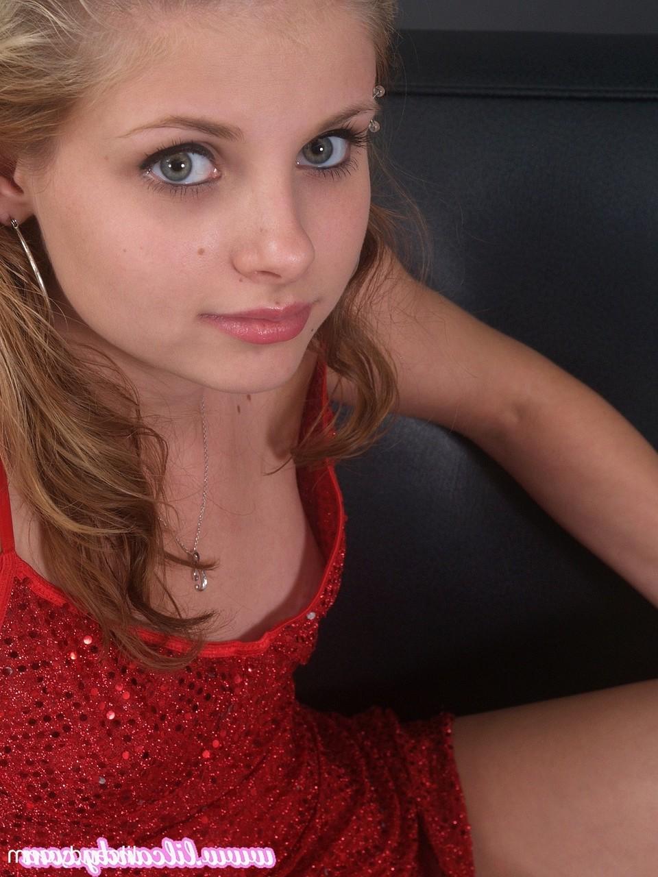 16P Pretty babe Lil Candy flashes a pantyless upskirt showing her bald pussy