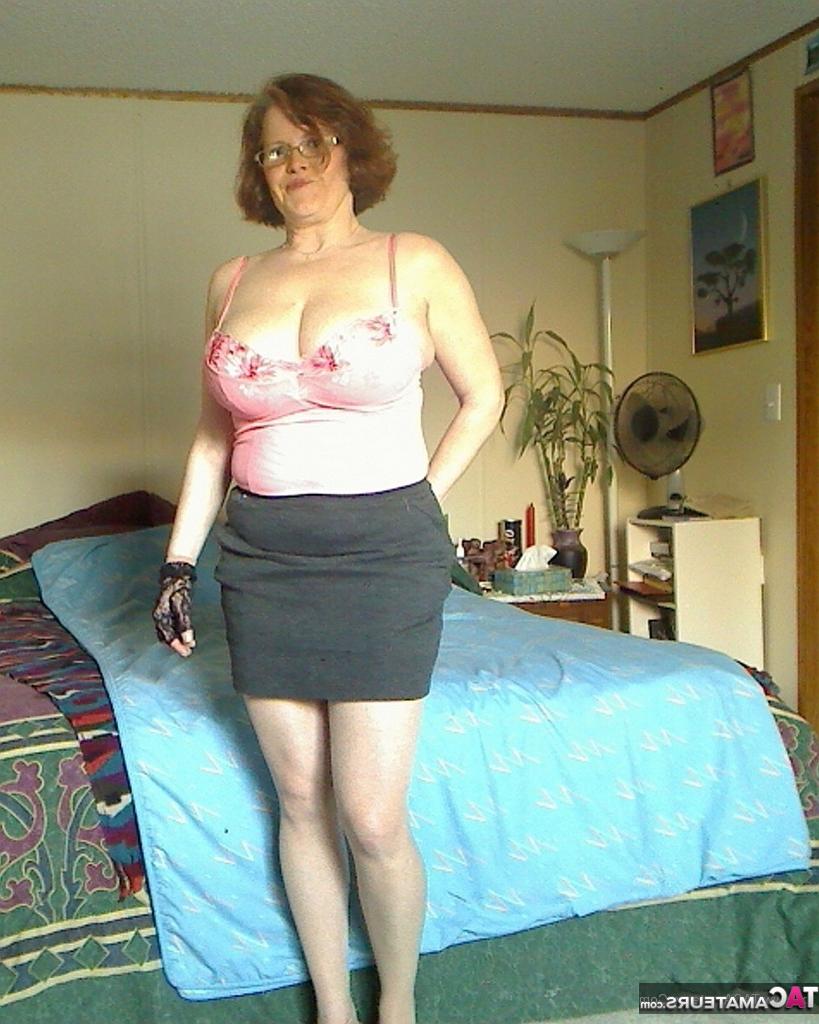 20P Redheaded amateur Misha MILF dildos her cunt after unleashing her huge tits