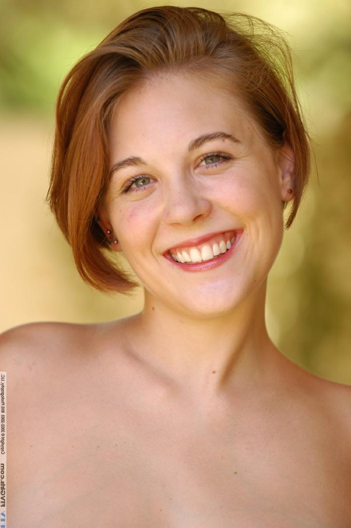 20P Beautiful ginger Violet losing her clothes outside and posing naked