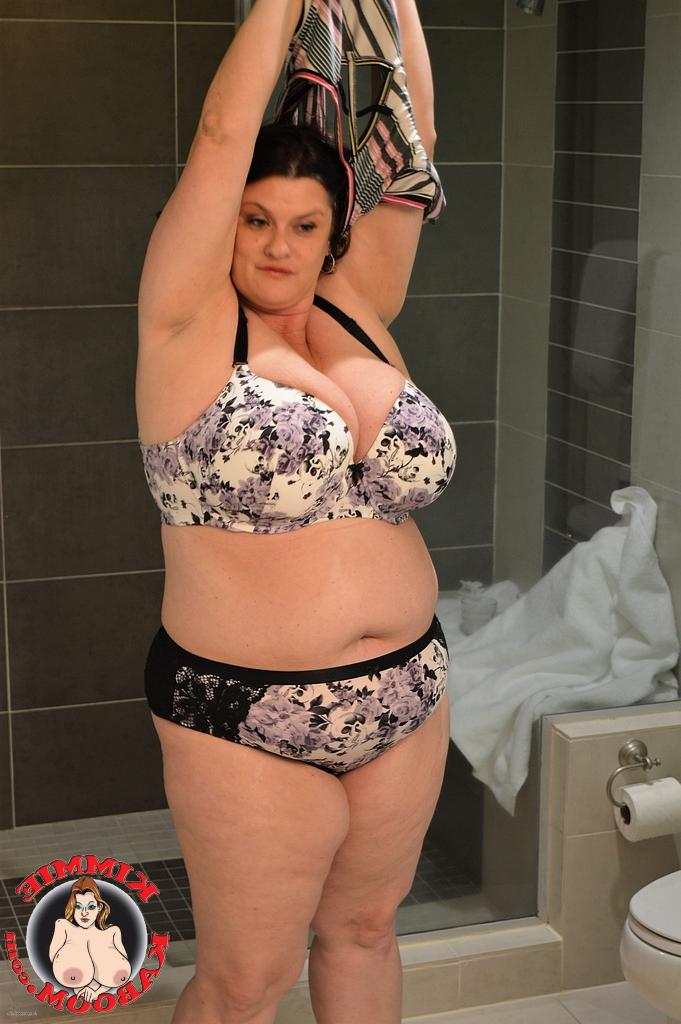 15P Brunette BBW Kimmie Kaboom plays with her big boobs & milk in the shower