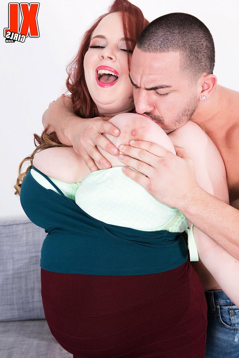 16P Overweight redhead Quinn Rain seduces a hunky laborer in a miniskirt