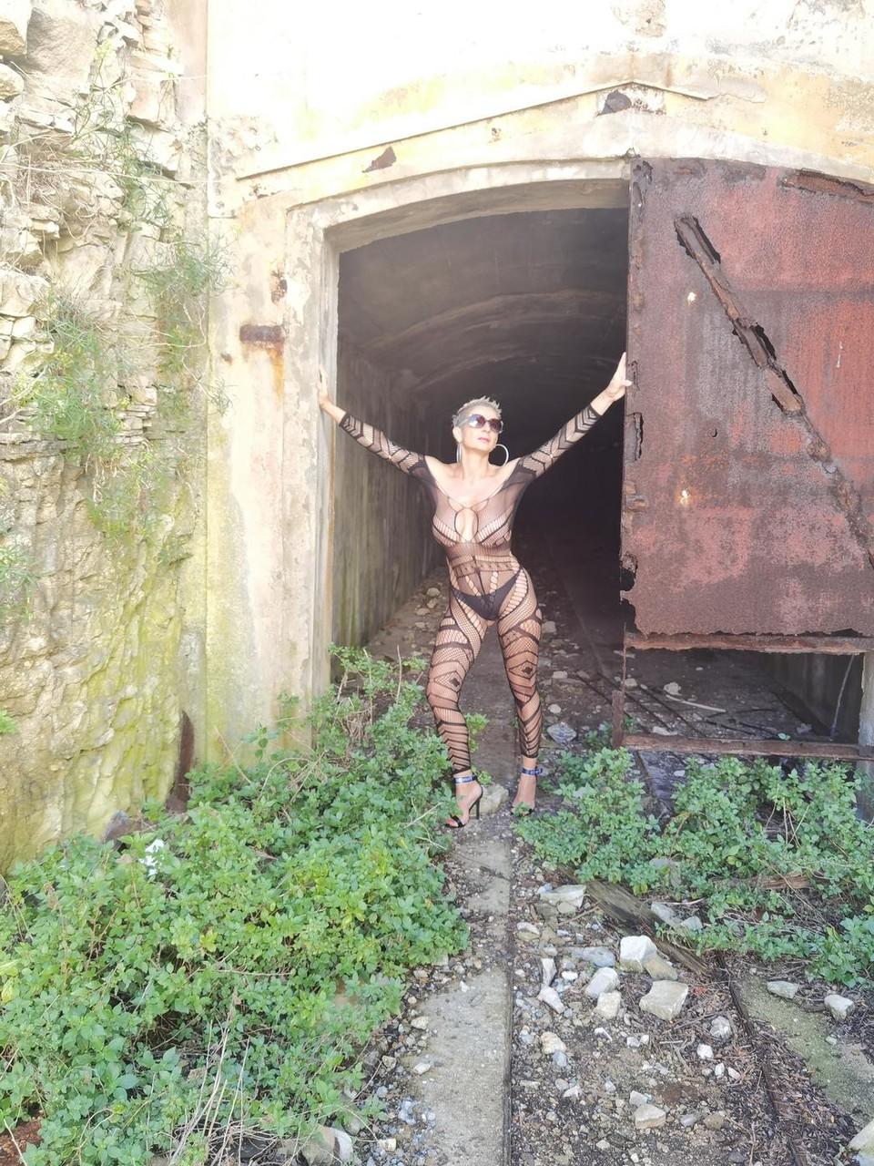 9P Attractive short-haired model flaunts her curves in her see-through lingerie
