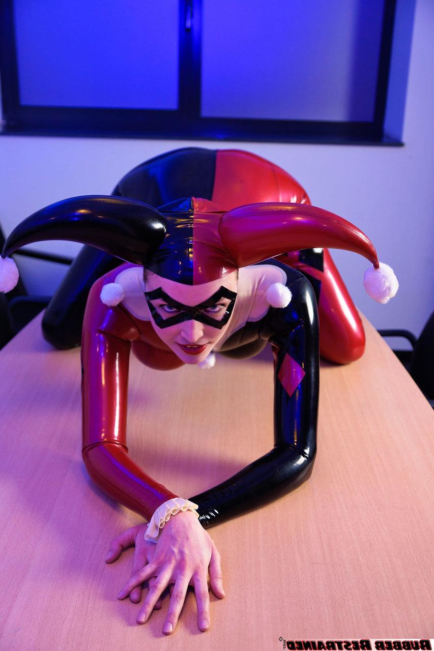 16P Solo model Dutch Dame poses in a latex Harley Quinn outfit