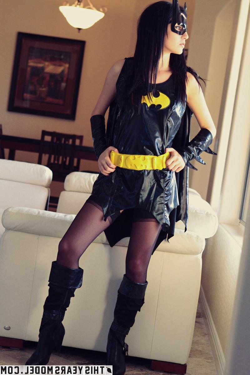 15P Sweet brunette Catie Minx models cosplay clothing before starting to undress