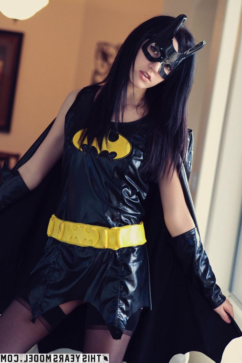 15P Sweet brunette Catie Minx models cosplay clothing before starting to undress