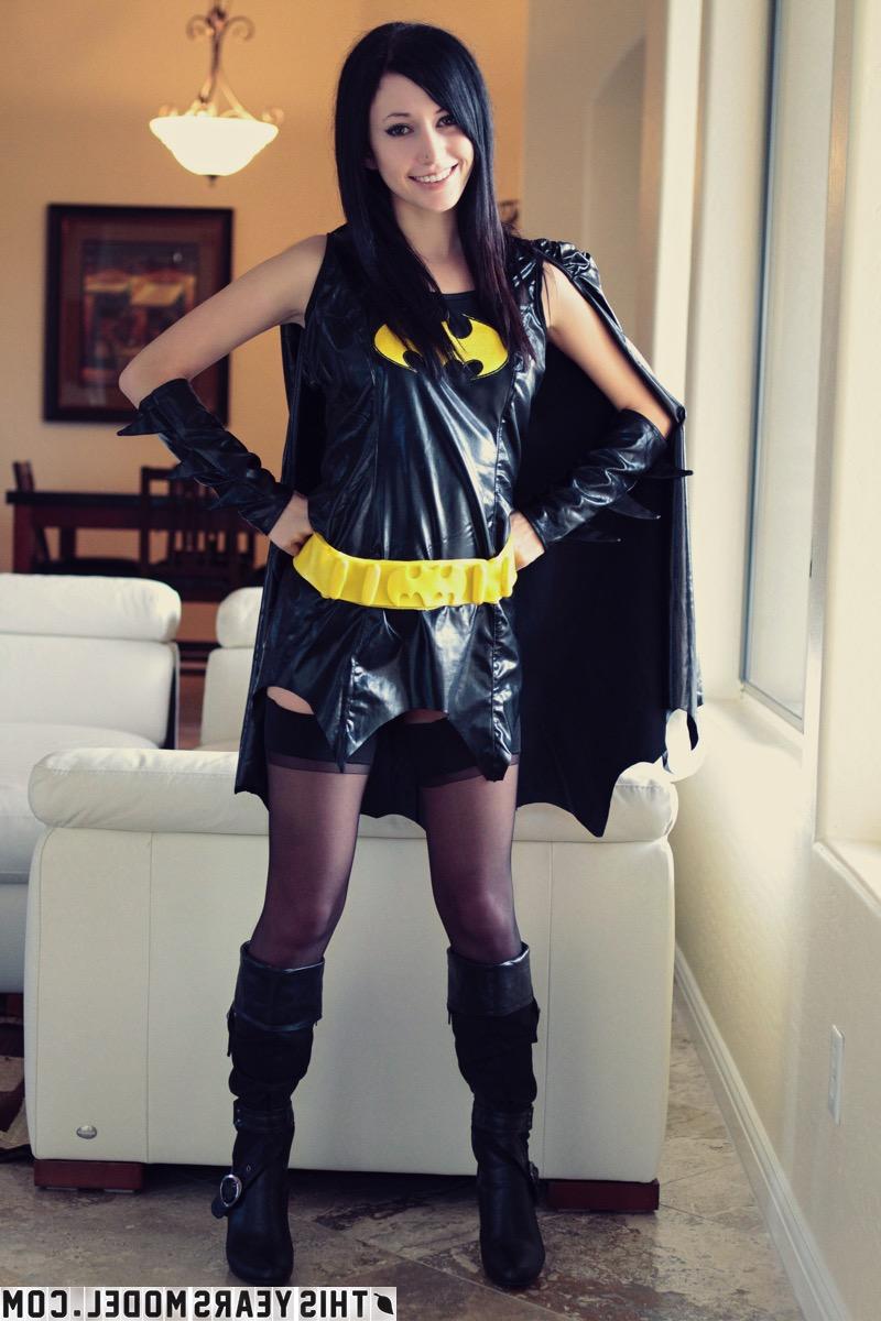 15P Sweet brunette Catie Minx models cosplay clothing before starting to undress